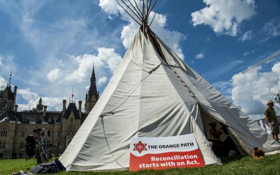 A teepee stands in front of Parliament in Ottawa, Ontario, Aug. 21, 2021.