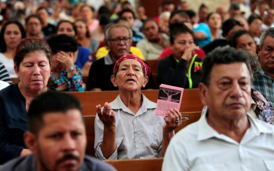 A woman prays during a Mass at the Metropolitan Cathedral in Managua, Nicaragua, Nov. 21, 2019. Six churchmen and a diocesan journalist were convicted in Nicaragua Jan. 26, 2023, on charges of conspiracy in what is an escalation of the persecution of the Catholic Church in the Central American country. (OSV News photo/Oswaldo Rivas, Reuters)