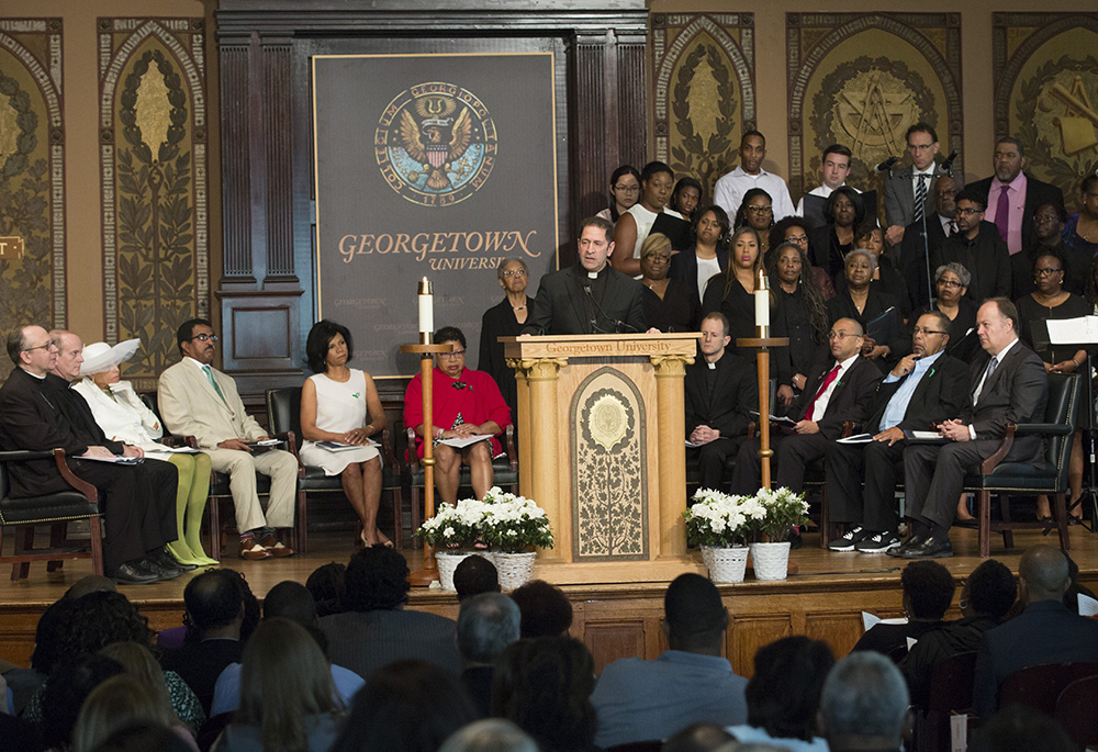 Jesuit Fr. Timothy Kesicki, then president of the Jesuit Conference of Canada and the United States, speaks at a Liturgy of Remembrance, Contrition and Hope April 18, 2017, at Georgetown University. The liturgy was held to acknowledge and seek reconciliation for the Jesuits' 1838 sale of 272 enslaved men, women and to help secure the financial future of Georgetown University. (OSV News/Catholic Standard/Jaclyn Lippelmann)