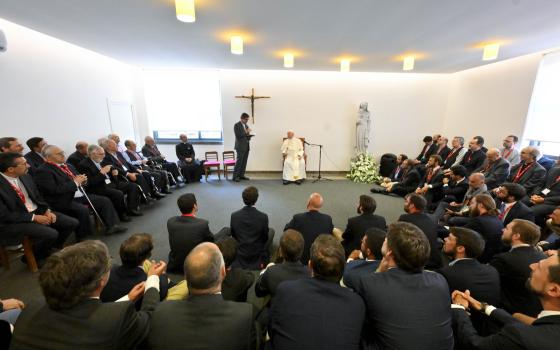 Pope Francis meets with about 90 Jesuits at their St. John de Brito College in Lisbon, Portugal, Aug. 5, 2023. (CNS photo/Vatican Media)